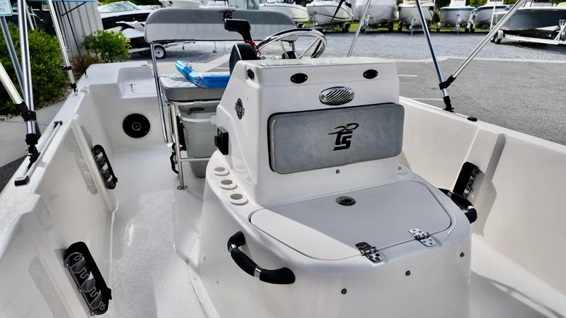 Slide: The Image of 2025 Carolina Skiff 178 JLS CC boat interior with console and seating. - 6