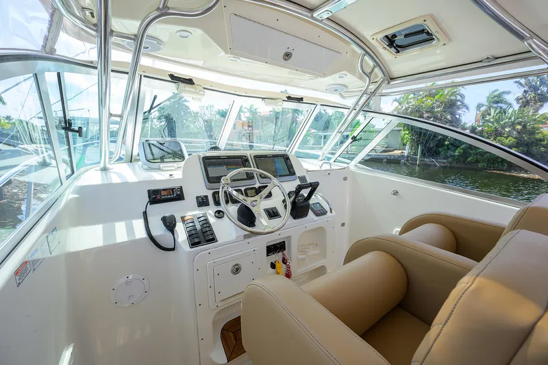 Slide: The Image of Pursuit 34 Nauti-Hooker - Helm Electronics and Seating - 10