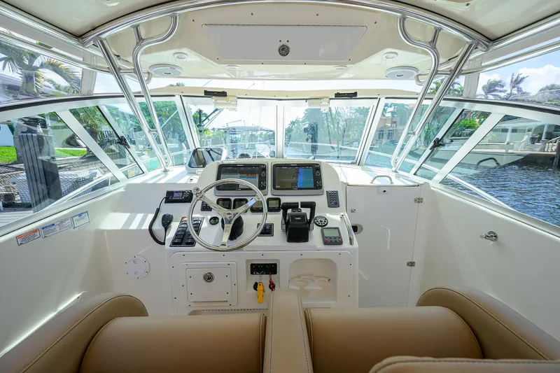 Slide: The Image of Pursuit 34 Nauti-Hooker - Helm Electronics and Seating - 11