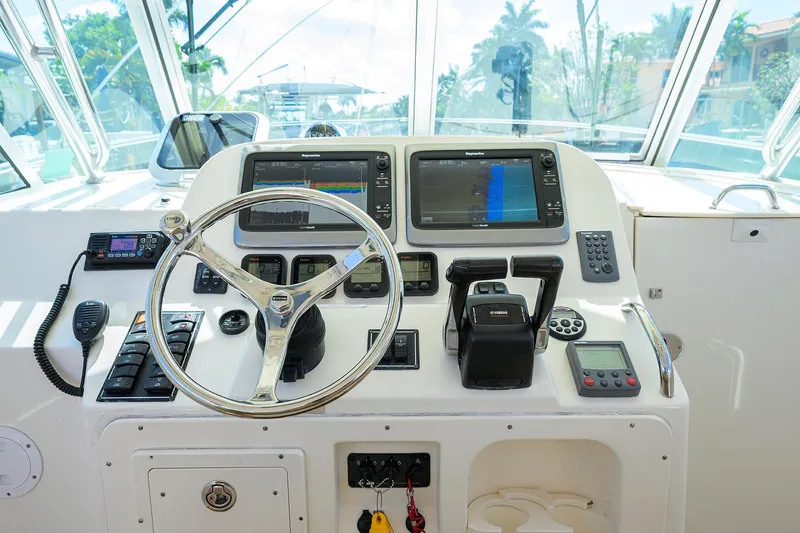 Slide: The Image of Pursuit 34 Nauti-Hooker - Helm Electronics  - 15