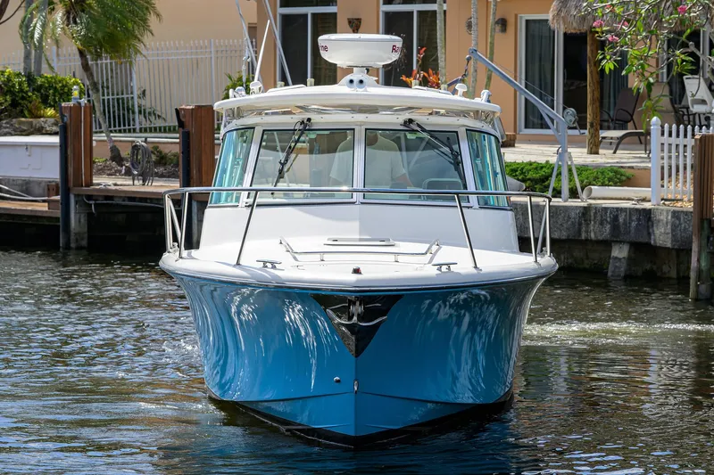 Slide: The Image of Pursuit 34 Nauti-Hooker - Bow Profile - 42