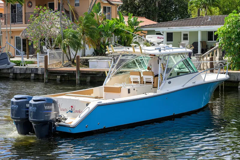 Slide: The Image of Pursuit 34 Nauti-Hooker -  Profile - 44