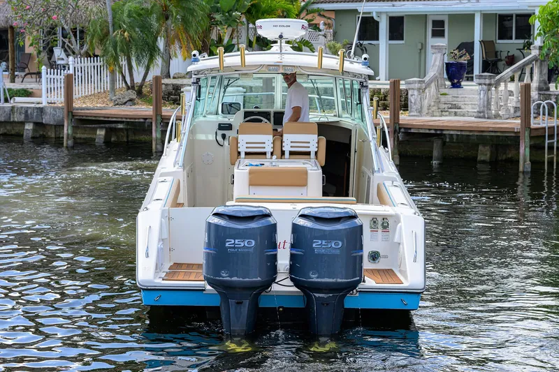 Slide: The Image of Pursuit 34 Nauti-Hooker - Aft Profile - 45