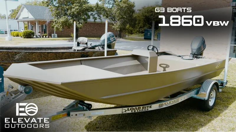 Slide: The Image of 2025 G3 1860VBW boat on trailer, displayed outdoors with Elevate Outdoors branding. - 0