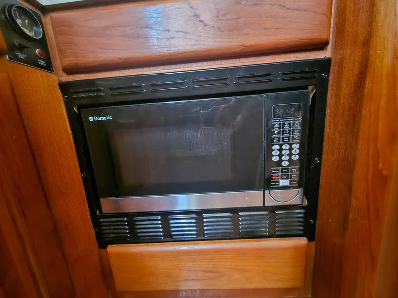 Slide: The Image of Built-in microwave in 1991 Viking 45 Convertible yacht kitchen. - 16