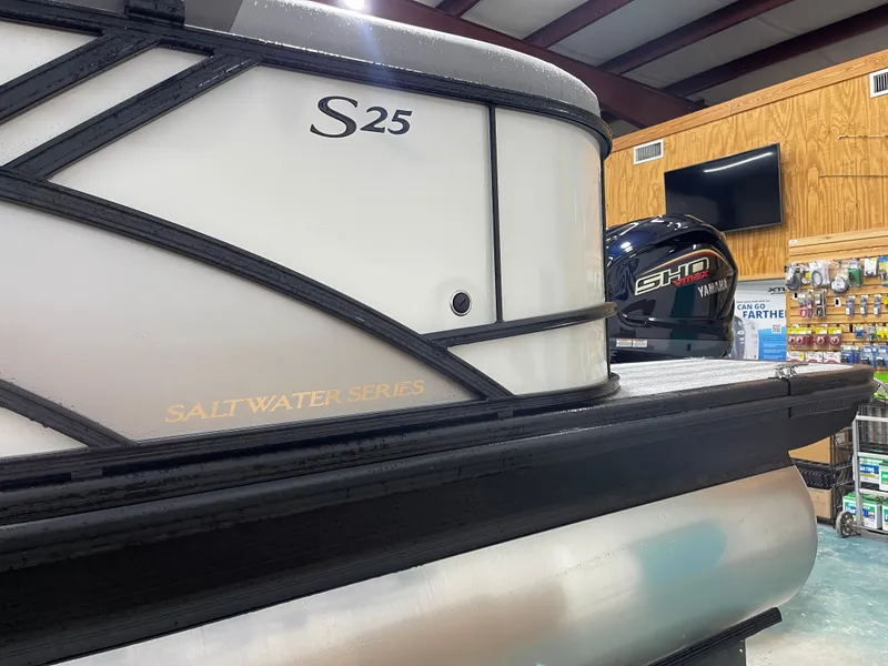 Slide: The Image of 2025 Bennington 25SSRSE Salt Water Series pontoon boat with Yamaha outboard motor. - 7