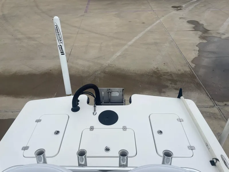 Slide: The Image of 2013 Majek 22 XTREME boat deck with storage compartments and Power-Pole anchor. - 10