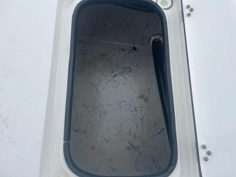 Slide: The Image of Open storage compartment on a 2013 Majek 22 XTREME boat. - 13