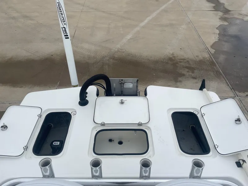 Slide: The Image of 2013 Majek 22 XTREME boat deck with storage compartments and Power-Pole Pro II. - 14