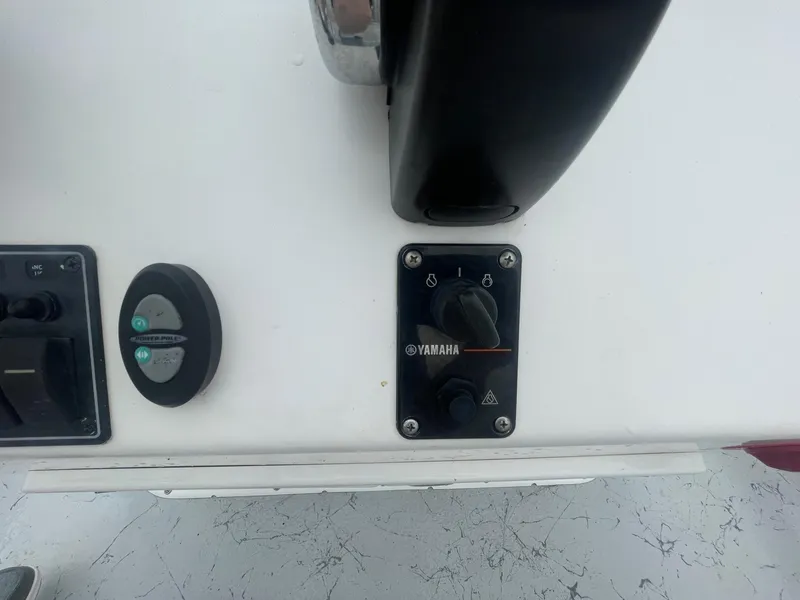 Slide: The Image of Control panel of a 2013 Majek 22 XTREME boat featuring Yamaha components. - 19