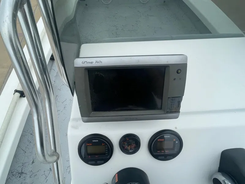 Slide: The Image of 2013 Majek 22 XTREME boat dashboard with Garmin GPSmap 740s and Yamaha gauges. - 21