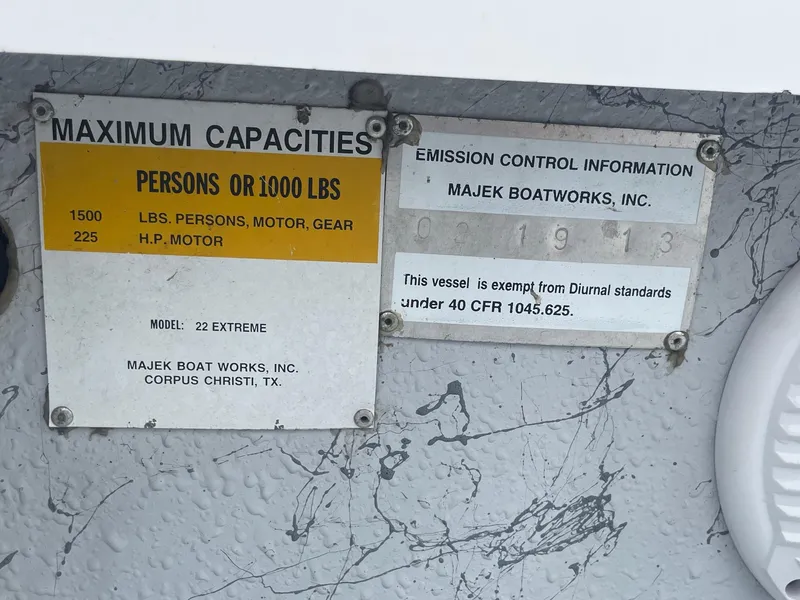 Slide: The Image of 2013 Majek 22 XTREME capacity and emission control information plate. - 37