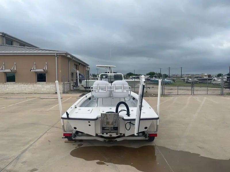 Slide: The Image of 2013 Majek 22 XTREME boat parked outdoors on a cloudy day. - 8