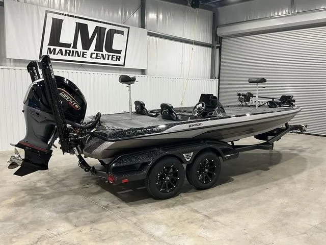 Slide: The Image of 2025 Skeeter FXR21L bass boat in showroom, featuring sleek design and powerful engine. - 5