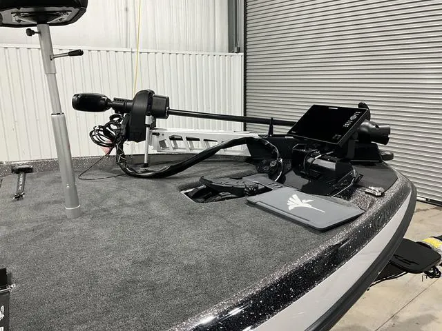 Slide: The Image of 2025 Skeeter FXR21L boat deck with advanced fishing equipment and electronics. - 9