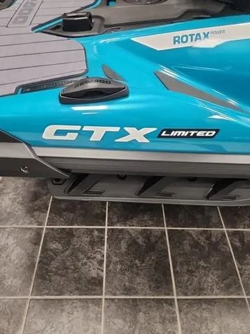 Slide: The Image of 2025 Sea-Doo Waverunner GTX Limited, blue with Rotax power, on tiled floor. - 11