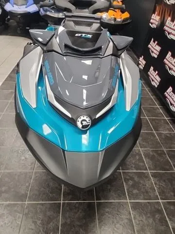 Slide: The Image of 2025 Sea-Doo Waverunner GTX in showroom, featuring sleek design and vibrant colors. - 5
