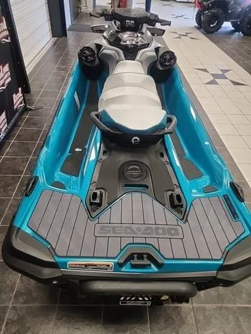 Slide: The Image of 2025 Sea-Doo Waverunner GTX in showroom, featuring sleek design and vibrant blue color. - 6