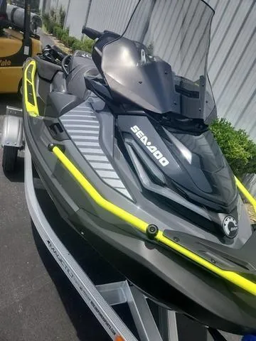 Slide: The Image of 2025 Sea-Doo Waverunner Explorer Pro on trailer, featuring sleek design and vibrant accents. - 18