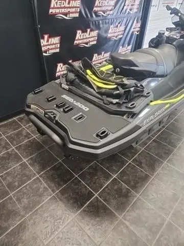 Slide: The Image of 2025 Sea-Doo Waverunner Explorer Pro on display at RedLine Powersports showroom. - 2