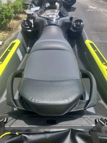 Slide: The Image of 2025 Sea-Doo Waverunner Explorer Pro with sleek black seat and vibrant yellow accents. - 22