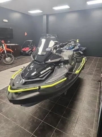Slide: The Image of 2025 Sea-Doo Waverunner Explorer Pro in a showroom with motorcycles. - 6
