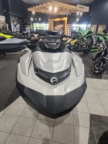 Slide: The Image of 2025 Sea-Doo Waverunner GTX displayed in a showroom with other vehicles. - 7