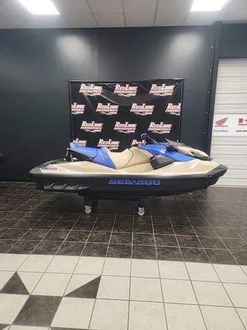 Slide: The Image of 2025 Sea-Doo Waverunner Wake 170 with blue accents and premium audio system. - 1