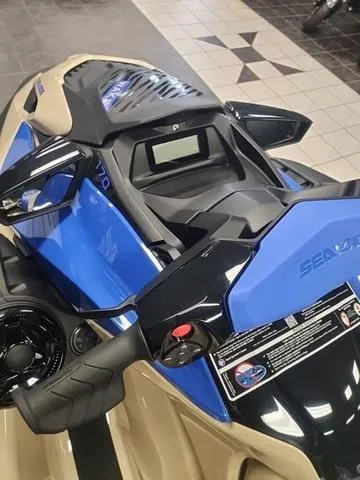 Slide: The Image of 2025 Sea-Doo Waverunner Wake™ 170 with BRP Premium Audio, blue and beige design. - 10