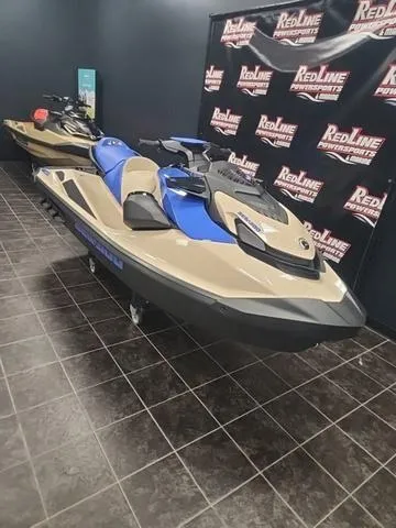 Slide: The Image of 2025 Sea-Doo Waverunner Wake™ 170 with BRP Premium Audio on display indoors. - 2