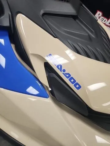 Slide: The Image of 2025 Sea-Doo Waverunner Wake 170, beige and blue design, close-up view. - 3
