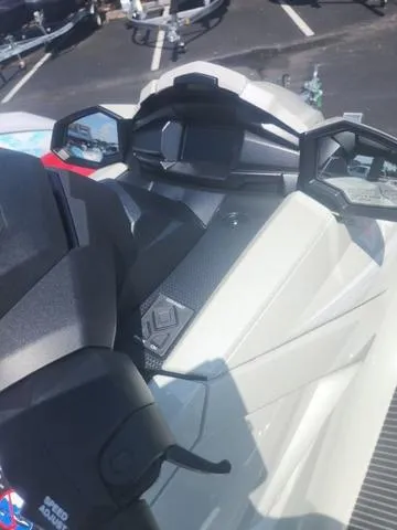 Slide: The Image of 2025 Yamaha WaveRunner VX Cruiser HO dashboard and controls in a parking lot. - 11