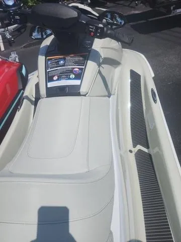 Slide: The Image of 2025 Yamaha WaveRunner VX Cruiser HO, sleek design, white seat, outdoor display. - 8