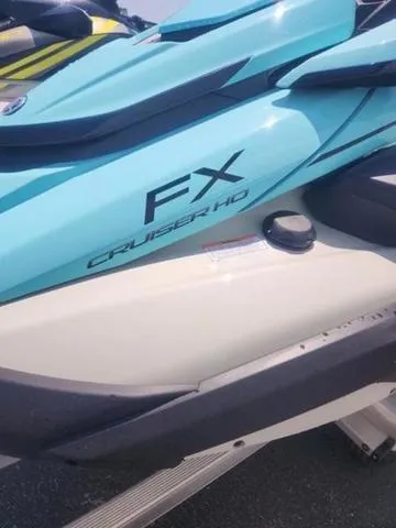 Slide: The Image of 2025 Yamaha WaveRunner FX Cruiser HO in light blue and white, side view. - 9