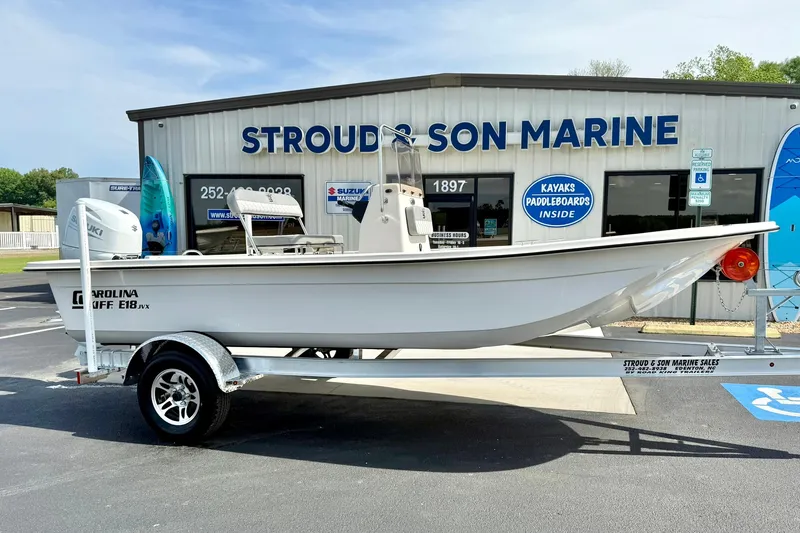 Slide: The Image of 2025 Carolina Skiff E18 JVX CC boat on trailer at Stroud & Son Marine. - 33
