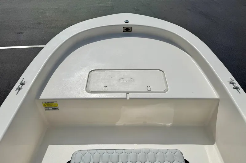 Slide: The Image of 2025 Carolina Skiff E18 JVX CC boat deck with storage compartment. - 38