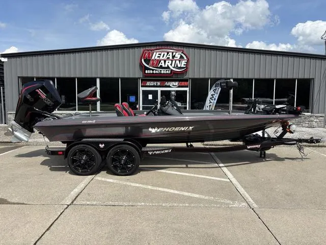 Slide: The Image of 2023 Phoenix 920 Elite II boat parked at Wieda's Marine dealership. - 1