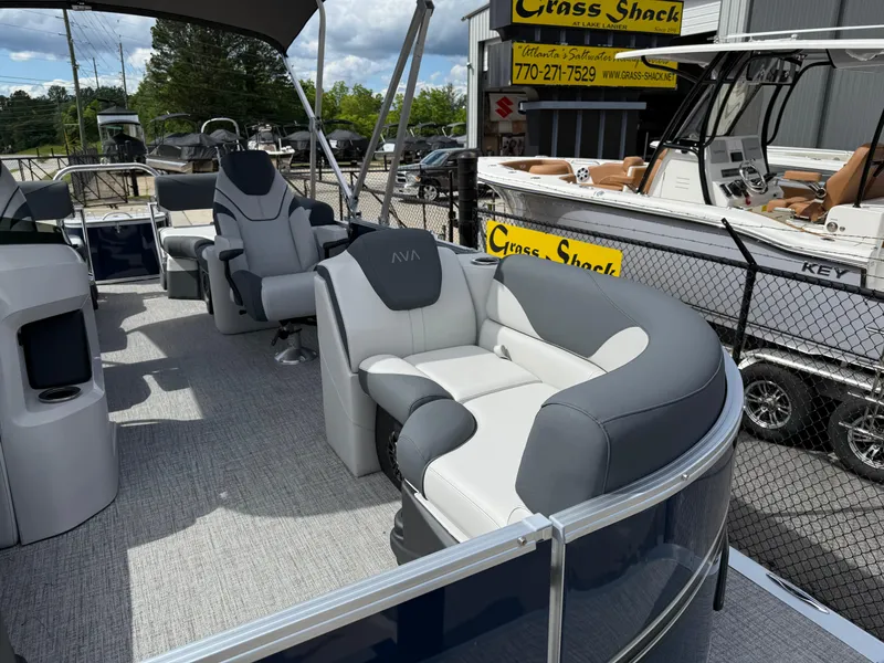 Slide: The Image of 2025 Avalon LSZ Quad Lounger Shift pontoon boat with luxurious seating and modern design. - 17