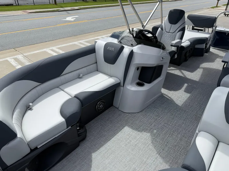 Slide: The Image of 2025 Avalon LSZ Quad Lounger Shift boat interior with sleek seating and modern design. - 18