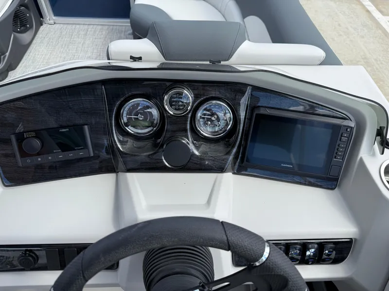 Slide: The Image of 2025 Avalon LSZ Quad Lounger Shift dashboard with modern controls and sleek design. - 26