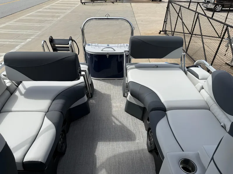 Slide: The Image of 2025 Avalon LSZ Quad Lounger Shift boat interior with plush seating and modern design. - 33
