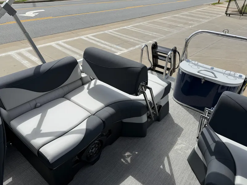 Slide: The Image of 2025 Avalon LSZ Quad Lounger Shift boat interior with plush seating and modern design. - 35