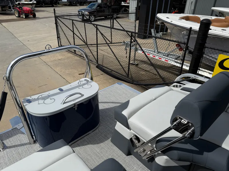 Slide: The Image of 2025 Avalon LSZ Quad Lounger Shift boat interior with modern seating and control panel. - 36