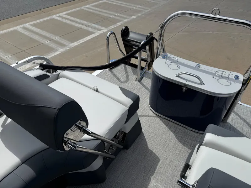 Slide: The Image of 2025 Avalon LSZ Quad Lounger Shift boat interior with sleek seating and modern console design. - 37