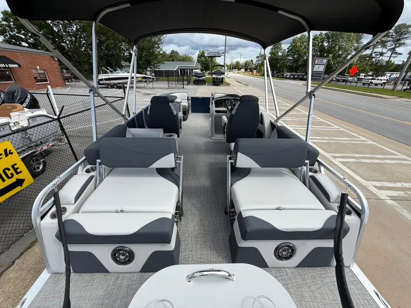 Slide: The Image of 2025 Avalon LSZ Quad Lounger Shift pontoon boat with spacious seating and modern design. - 38