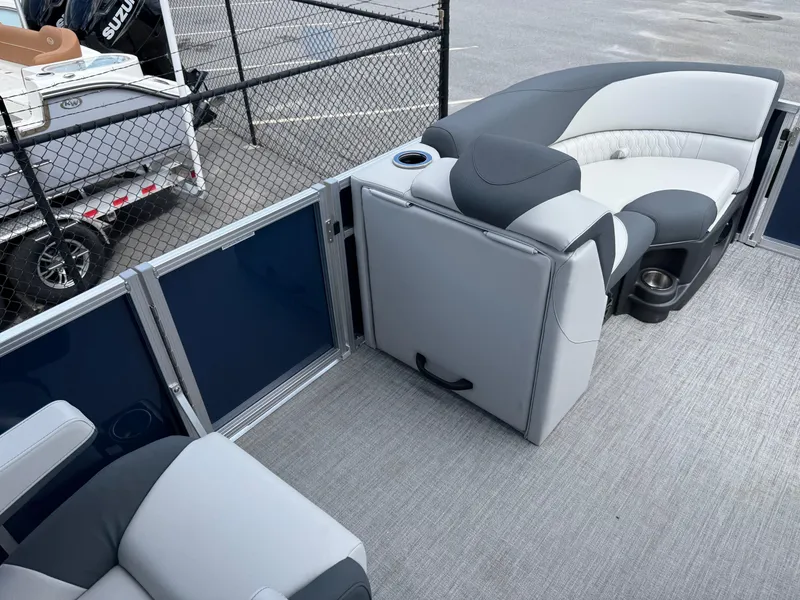 Slide: The Image of 2025 Avalon LSZ Quad Lounger Shift pontoon boat interior with plush seating and modern design. - 44