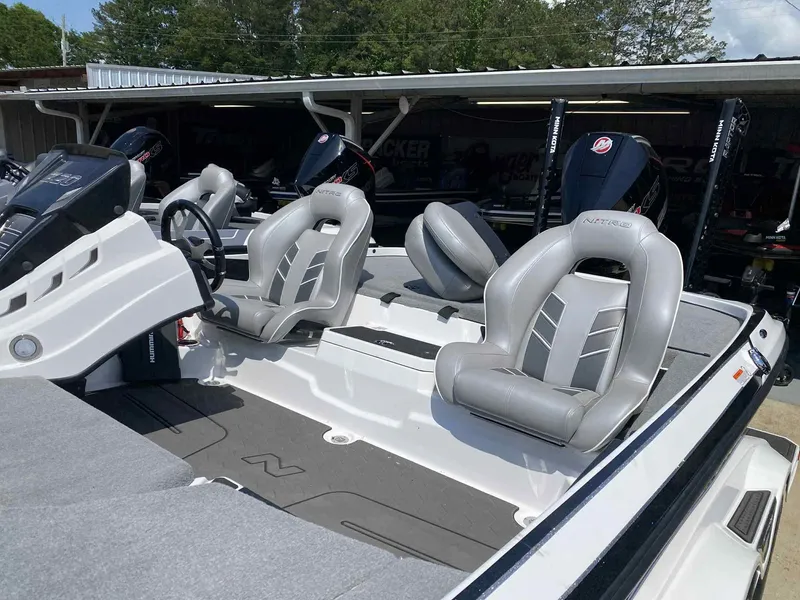 Slide: The Image of 2024 Nitro Z20 Pro boat with sleek gray seating and modern design. - 4