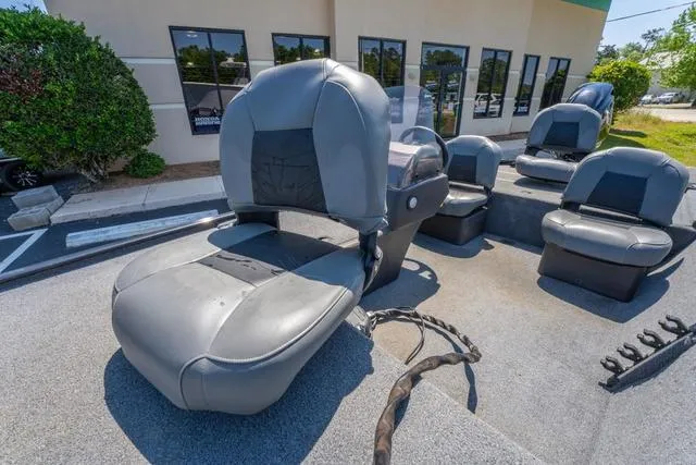 Slide: The Image of 2021 Tracker BASS TRACKER® Classic XL boat seats in a parking lot. - 13