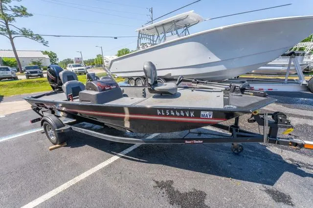 Slide: The Image of 2021 Tracker BASS TRACKER® Classic XL boat on trailer in parking lot. - 6