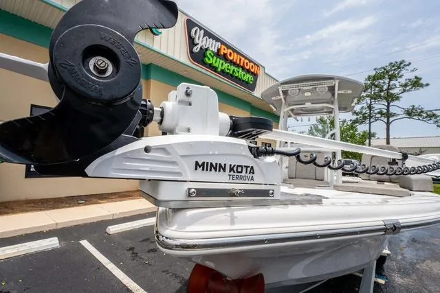 Slide: The Image of 2023 Sea Pro 228 Bay boat with Minn Kota Terrova motor at a pontoon superstore. - 7
